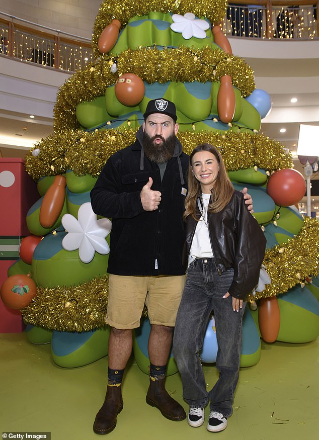 The former rugby union player even stopped for a photo with Dani Dyer, 29, who arrived with her children