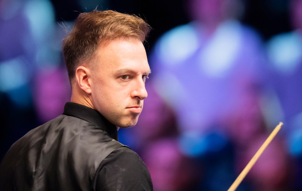 Judd Trump looking over his shoulder during the 2025 Victorian Plumbing UK Championship.