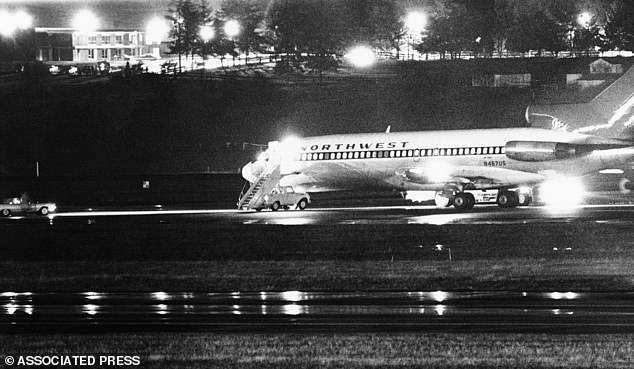 Northwestern Flight 305 is seen after landing Seattle, where Cooper collected his ransom, ordered the aircraft to refuel, and later parachuted out