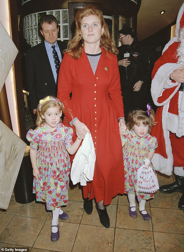 The former Duchess at Planet Hollywood with Princesses Beatrice and Eugenie in 1993