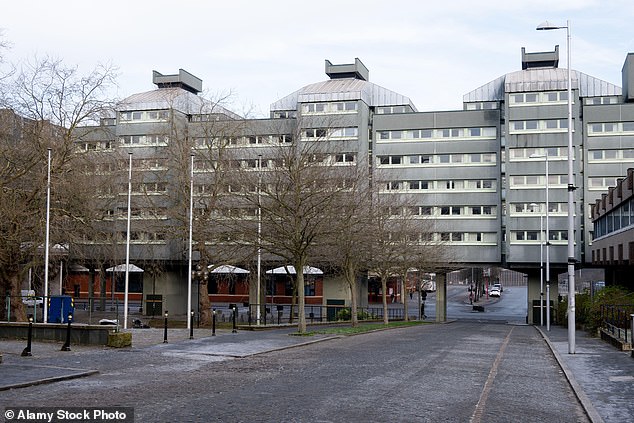 The building has a distinctive design featuring a series of interconnected blocks and prominent curved roof structures
