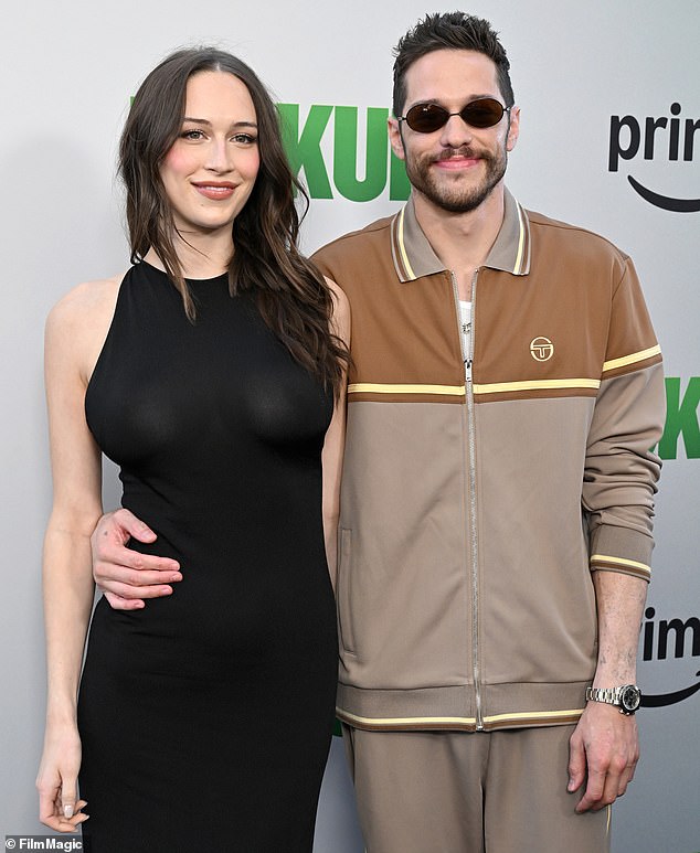 The SNL alum and the model - who were first romantically linked back in March - excitedly announced they are expecting baby number one together in July; seen in July in L.A.