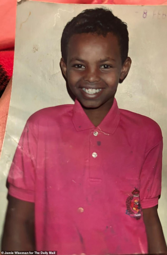 A picture of the 'real' Mohamed Farah - Sir Mo previously revealed that he was taken to the UK under the name of another child