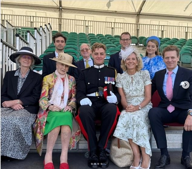 The young officer with his family after graduating from Sandhurst. He is pictured here (centre) with Princess Alexandra (in green) and his proud parents James and Julia Ogilvy (in the front row, to his left)