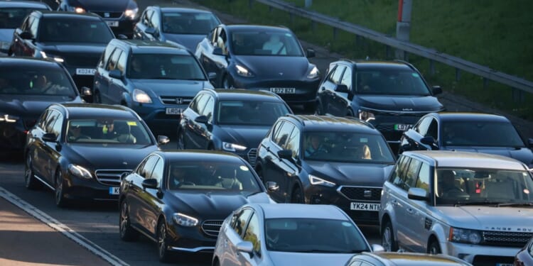 M4 closed after car crashes off motorway as drivers left trapped and facing long delays