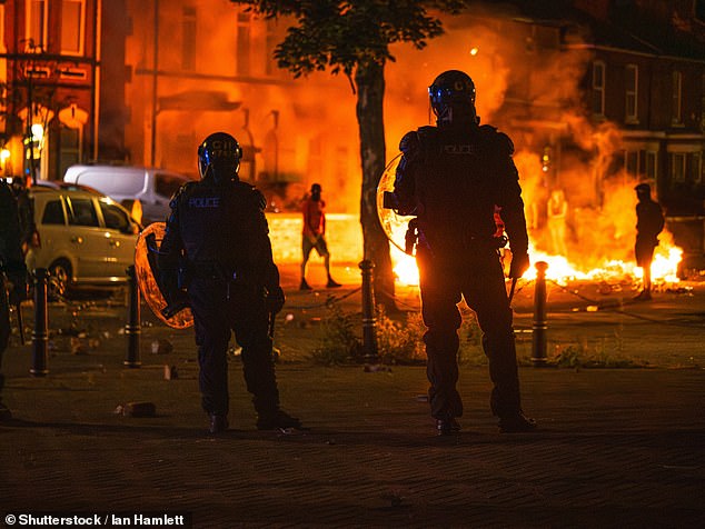Riot police on duty during the Southport riots, which followed the murders of three schoolgirls