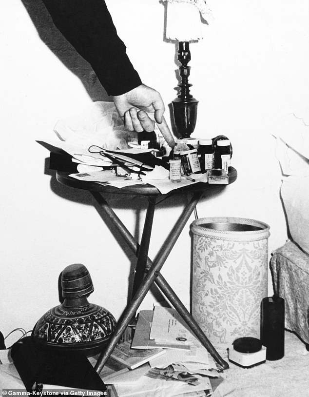 Pills can be seen on Marilyn Monroe's nightstand in the bedroom where she was discovered dead