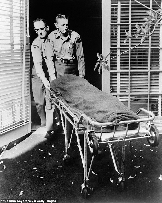 Police remove Marilyn Monroe's body from her home in Los Angeles on a gurney on August 5, 1962
