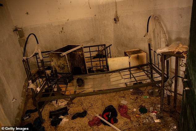 A bed is seen in a prisoners cell inside Sednaya Prison, nicknamed the 'Branch of Death' by former detainees