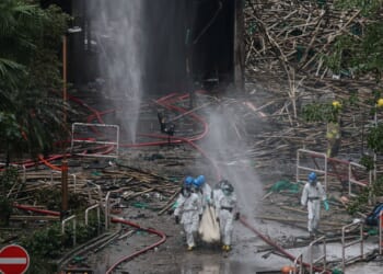 Hong Kong fire death toll rises to 146 with 150 still missing as search of scorched towers set to take up to four weeks