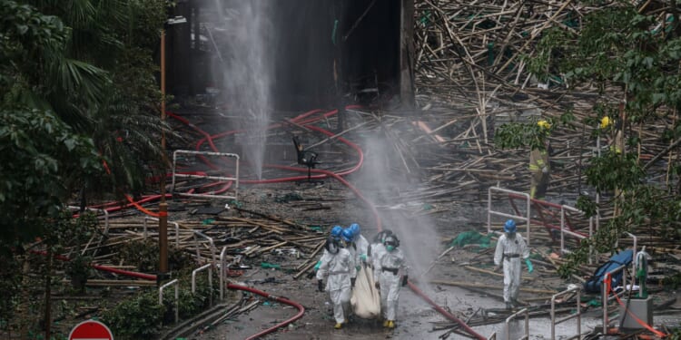 Hong Kong fire death toll rises to 146 with 150 still missing as search of scorched towers set to take up to four weeks