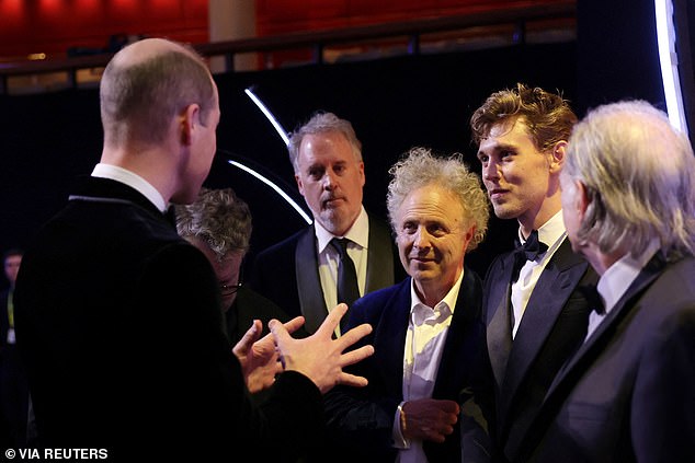 Mackesy is a close friend of the royal family and he has created bespoke illustrations for Kate Middleton, for last year's Christmas carol service, as well as for Queen Camilla. Pictured with Prince William in 2023