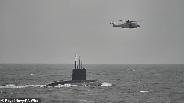 A specialist submarine hunting Merlin aircraft from 824 Naval Air Squadron, tracking Russian submarine the FN Novorossiysk as it sailed west through UK waters, photo issued July 2, 2025