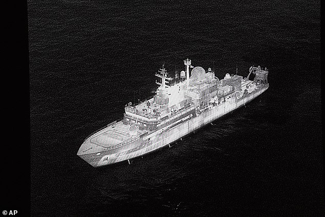 An image of the Russian spy ship Yantar operating off the northern coast of Scotland, shown on a screen during a speech by Defence Secretary John Healey, November 19, 2025