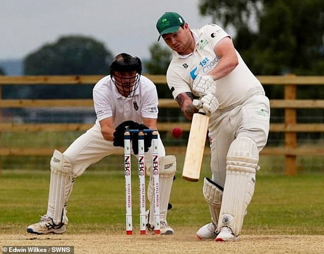 Mr Rigby is pictured playing cricket. He played twice a week for Allscott Heath CC in Shropshire with the help of a runner and an umpire holding his crutch