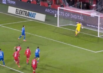 Ex-Tottenham star Troy Parrott consoled by team-mates after dreadful last-minute Panenka penalty to rescue a point
