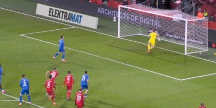 Ex-Tottenham star Troy Parrott consoled by team-mates after dreadful last-minute Panenka penalty to rescue a point