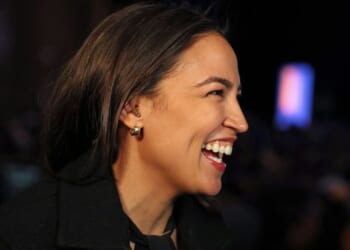 Rep. Alexandria Ocasio-Cortez celebrates New York City Mayoral candidate Zohran Mamdani's victory during an election night event in Brooklyn on Tuesday.