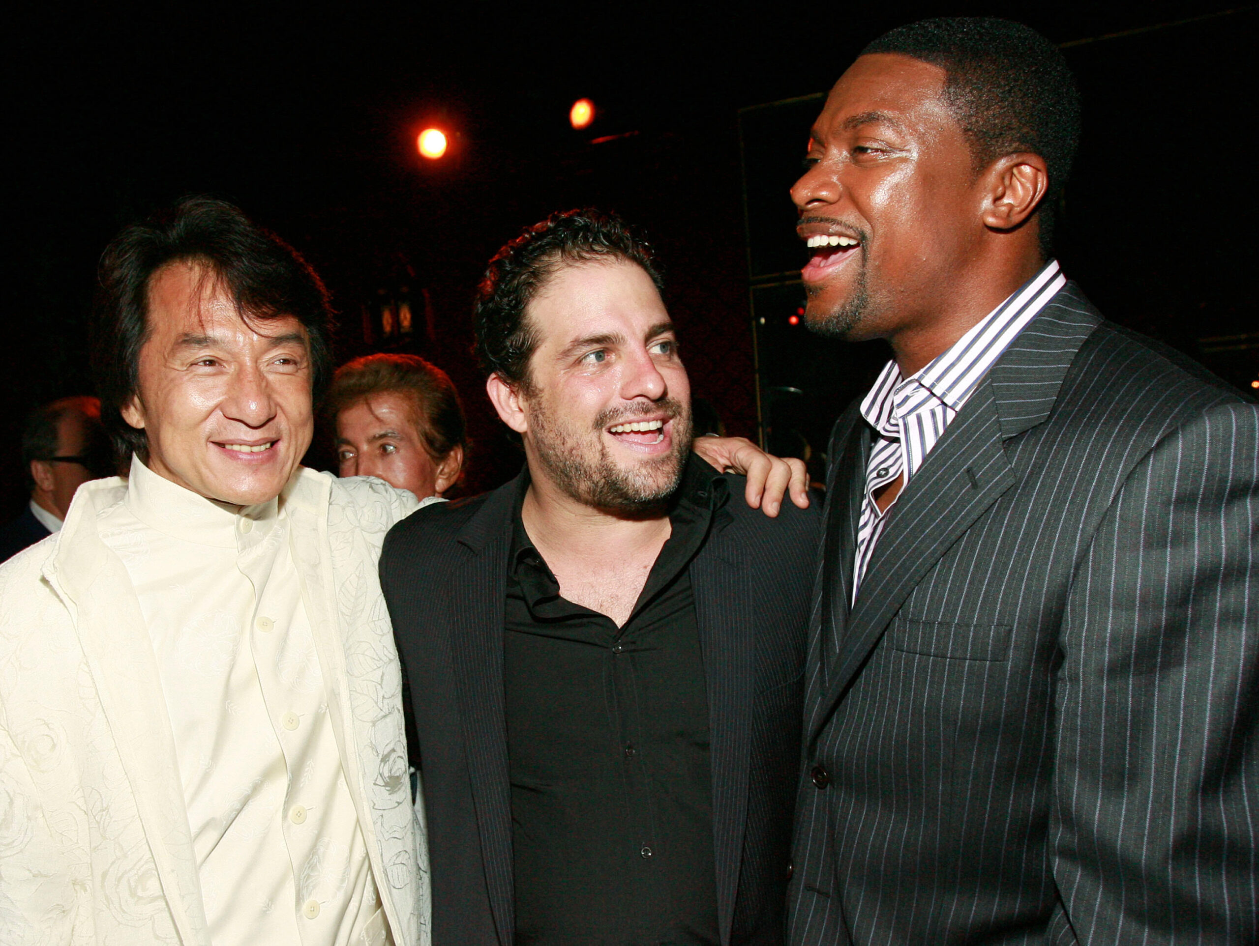Jackie Chan, Brett Ratner, and Chris Tucker appear at the "Rush Hour 3" premiere after party in Los Angeles on July 30, 2007.