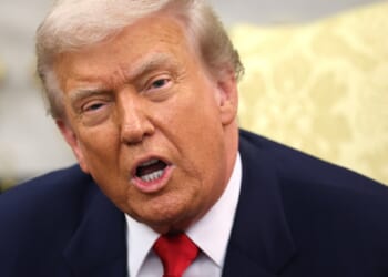 President Donald Trump, pictured in the Oval Office on Tuesday, took to social media over the weekend to declare that Chicago residents are begging for federal help against crime.