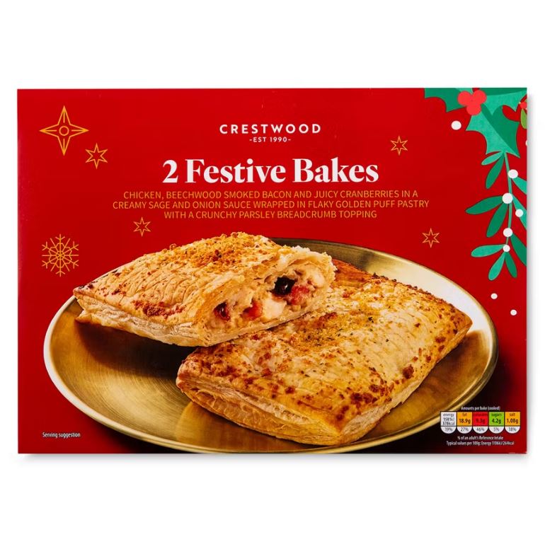 Aldi Festive Bakes box showing two golden puff pastries on a plate, filled with chicken, bacon, and cranberries.
