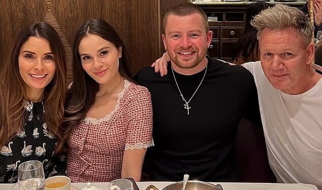 Holly Ramsay (pictured, second left) is pictured enjoying a meal with her fiance Adam Peaty (pictured, second right) and her parents Tana (far left) and Gordon (far right)