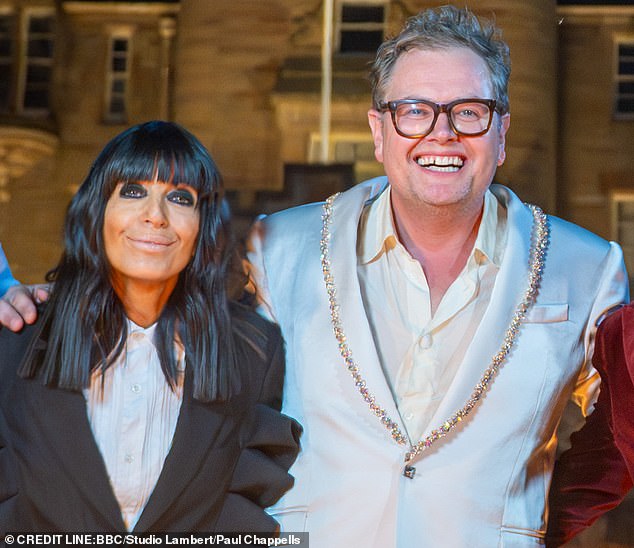 Comedian Alan Carr with Claudia Winkleman, host of The Celebrity Traitors