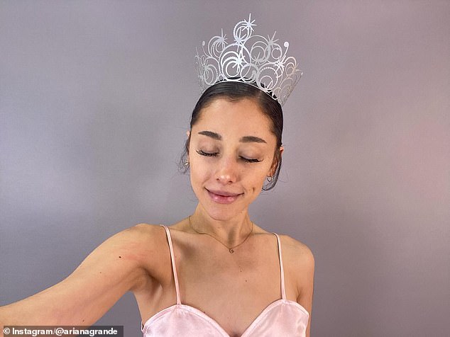 Grande was notably absent from the film's initial premiere in Brazil , and during the Singapore celebrations, a tense moment unfolded when a man jumped the red carpet barricades and rushed toward her