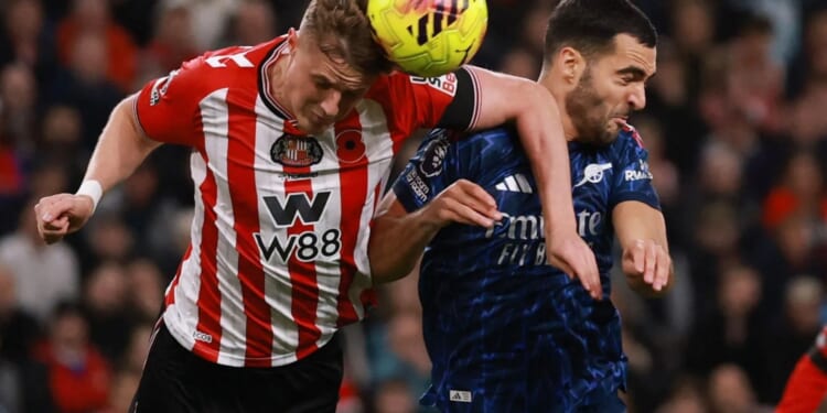 Arsenal star Mikel Merino needs urgent medical attention on head injury as fans demand red card