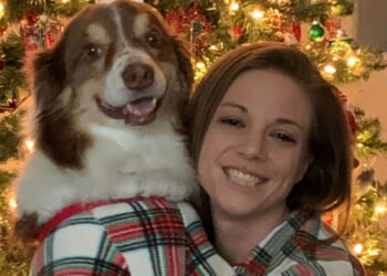 The Western Journal Supervising Story Editor Kassandra White poses for a Christmas photo with her dog Keller, affectionately called "The Floof."