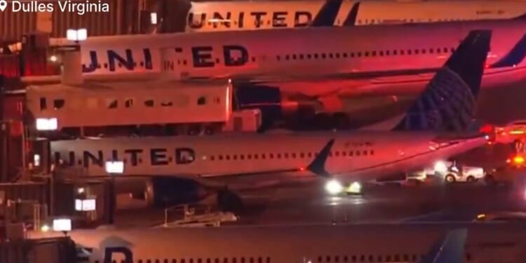 At least 18 plane passengers injured as ‘mobile lounge’ bus crashes into dock at Dulles International Airport