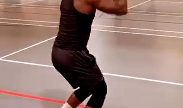 Congolese national Benjamin Katabana (pictured playing basketball), 27, is accused of stabbing to death Ucheena Okirie who was aged in his 30s at Somerleyton House, Norwich, Norfolk