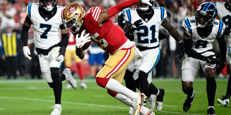 San Francisco 49ers wide receiver Jauan Jennings runs for a touchdown against the Carolina Panthers during the first half an NFL football game on Monday, Nov. 24, 2025, in Santa Clara, California.
