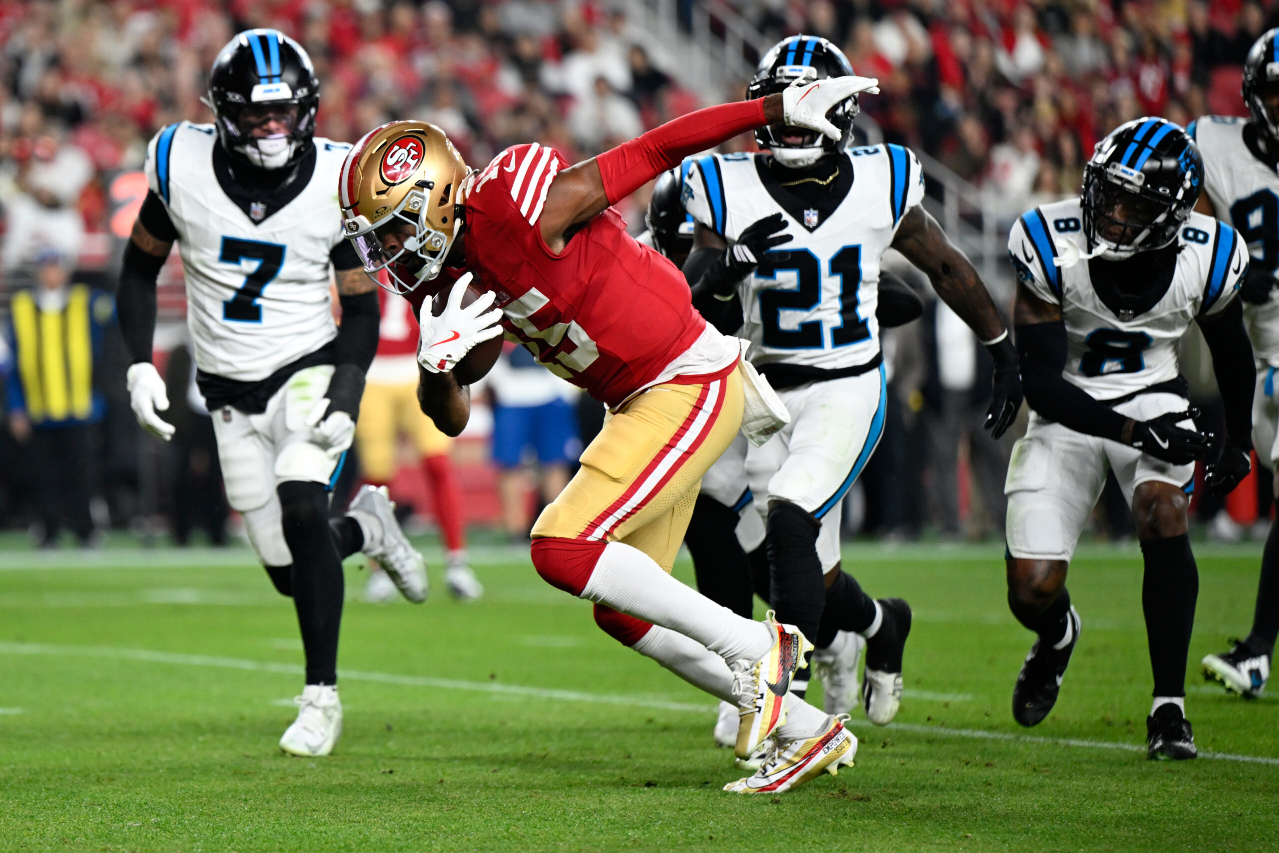 San Francisco 49ers wide receiver Jauan Jennings runs for a touchdown against the Carolina Panthers during the first half an NFL football game on Monday, Nov. 24, 2025, in Santa Clara, California.