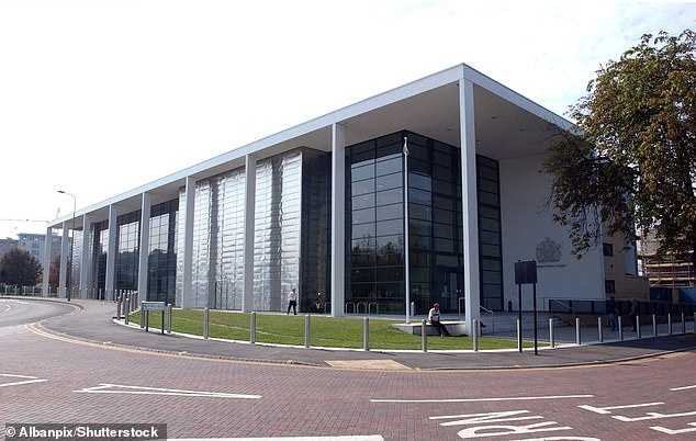 Ipswich Crown Court heard one of the officers had needed medical treatment so part of his ear could be glued back on as a result of the attack