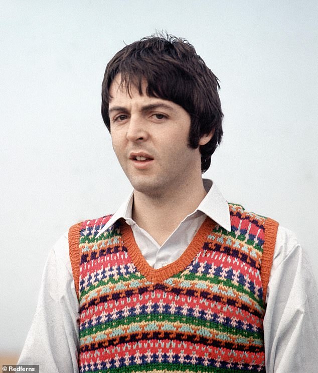 Paul McCartney of The Beatles posed wearing a Fair Isle tank top during filming of the television musical film 'Magical Mystery Tour'