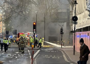 Black smoke is engulfing a central London district after fire erupted in an underground tunnel