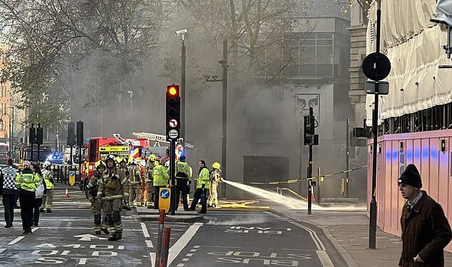 Black smoke is engulfing a central London district after fire erupted in an underground tunnel