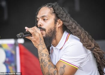 Pictured: Bobby Vylan, of punk duo Bob Vylan, performing on the West Holts Stage during the Glastonbury Festival this year