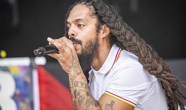 Pictured: Bobby Vylan, of punk duo Bob Vylan, performing on the West Holts Stage during the Glastonbury Festival this year