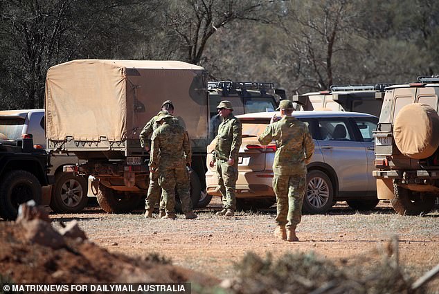 Pictured: Military at the scene three weeks after Gus was last seen