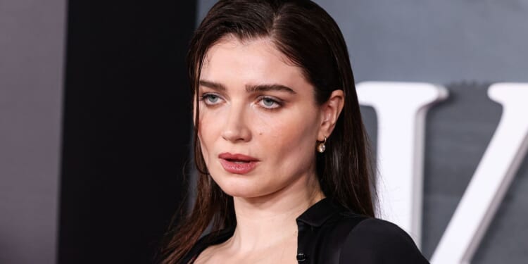 Bono's daughter Eve Hewson bares all in just a see-through black bra and skirt on LA red carpet