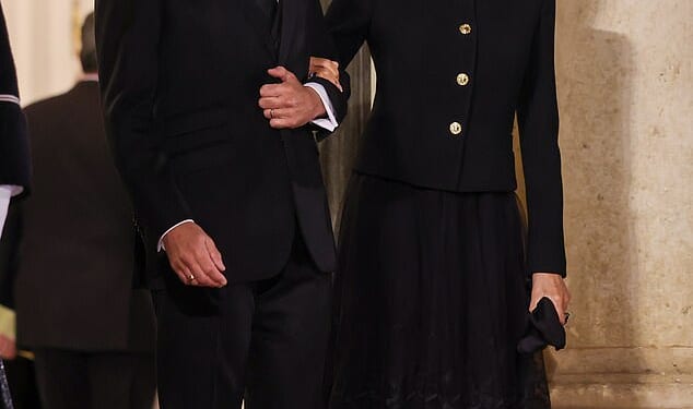 France's President Emmanuel Macron and First Lady Brigitte Macron are seen at the Elysee Palace dinner as part of the Paris Peace Forum at Elysee Palace on October 29, 2025 in Paris, France