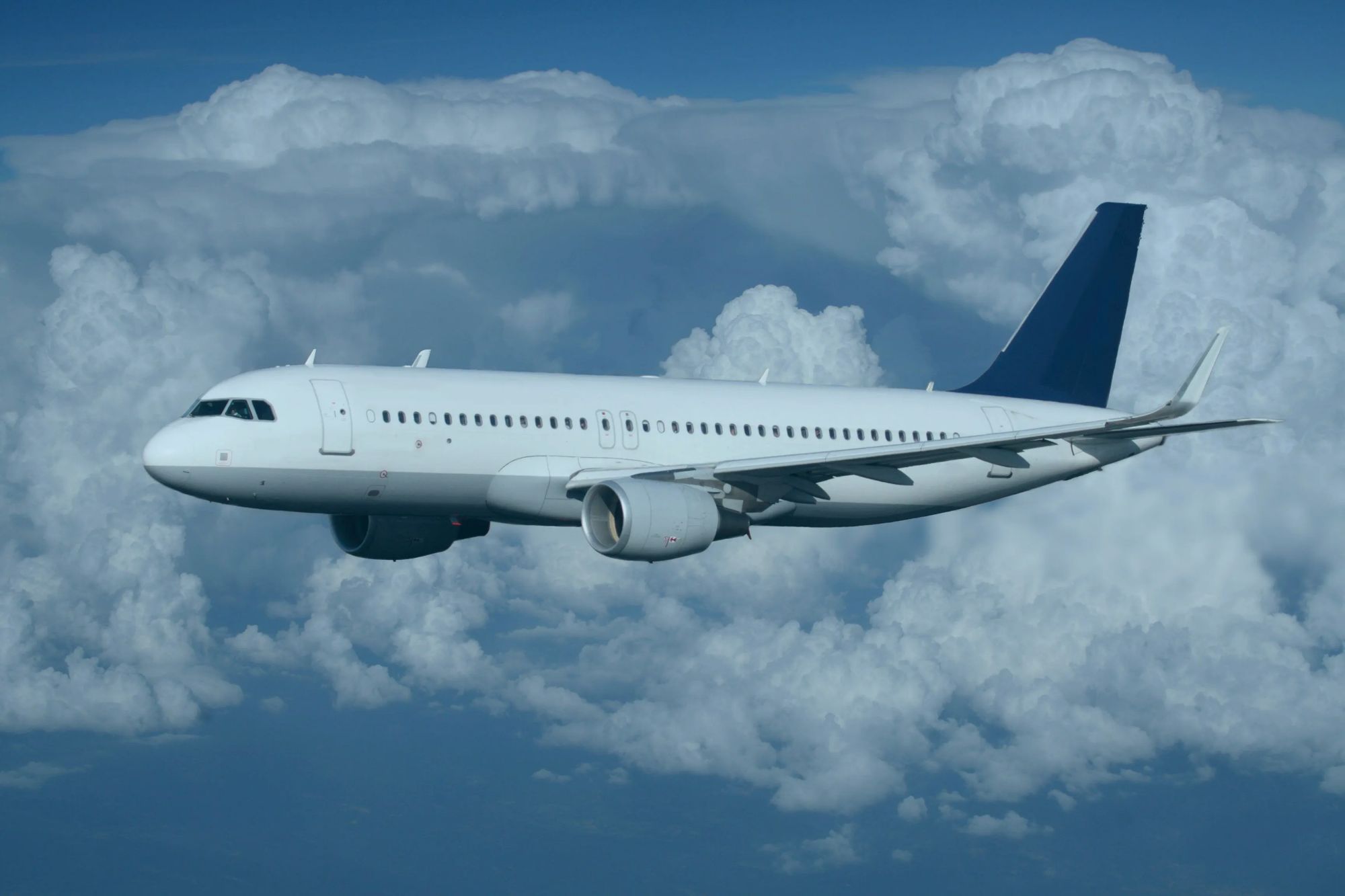 An image collage containing 1 images, Image 1 shows Airbus A320 passenger jet flying above clouds