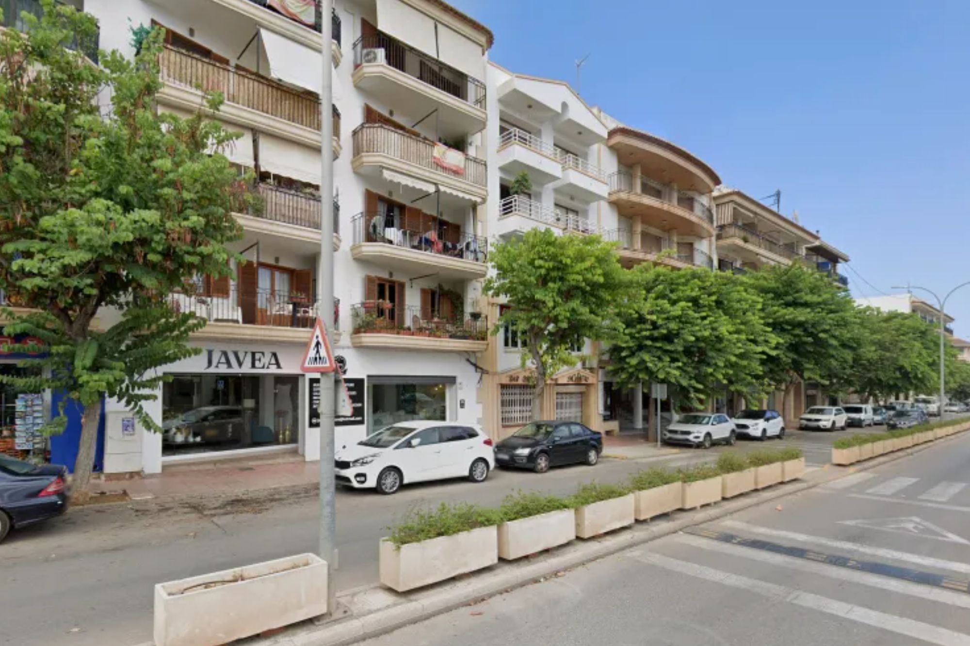 An image collage containing 1 images, Image 1 shows Street in Javea where a body was found between parked cars