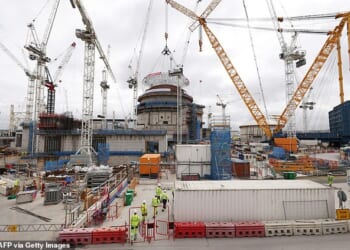 The world's largest land crane 'Big Carl' is used to position a 245-tonne domed roof on Hinkley Point C's second reactor building at the Hinkley Point C nuclear power station near Bridgwater