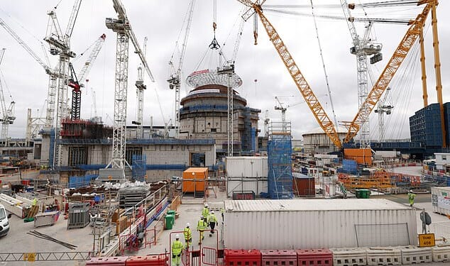 The world's largest land crane 'Big Carl' is used to position a 245-tonne domed roof on Hinkley Point C's second reactor building at the Hinkley Point C nuclear power station near Bridgwater