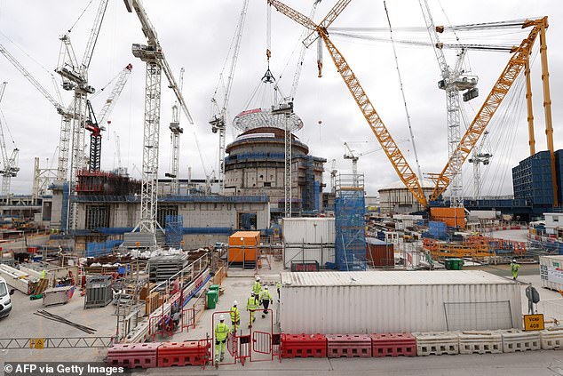 The world's largest land crane 'Big Carl' is used to position a 245-tonne domed roof on Hinkley Point C's second reactor building at the Hinkley Point C nuclear power station near Bridgwater