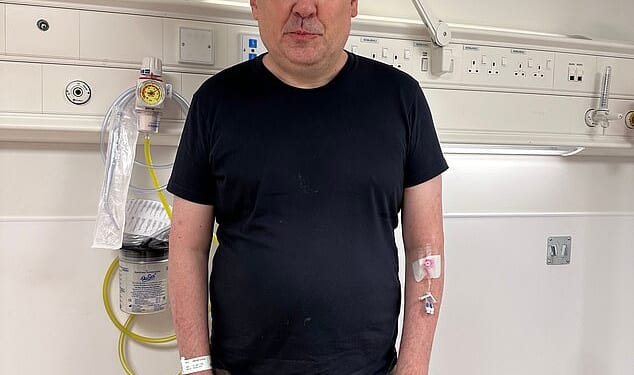 Graham Linehan (above) posted online this photo taken in A&E after he was tested for high blood pressure following his arrest in September 2025 at Heathrow airport