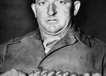 American executioner Staff Sergeant John C Woods, a  jug-eared drifter, gambler and heavy drinker